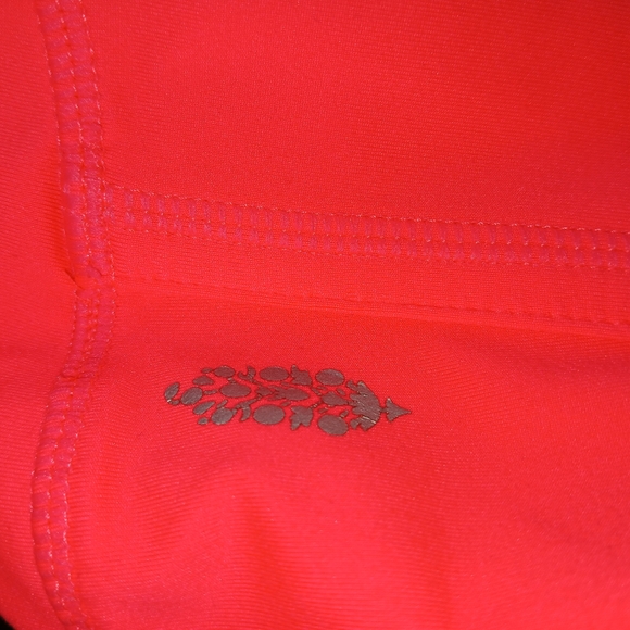 FP Movement High Rise Infinity Yoga Leggings in Vivid Coral - Picture 7 of 11